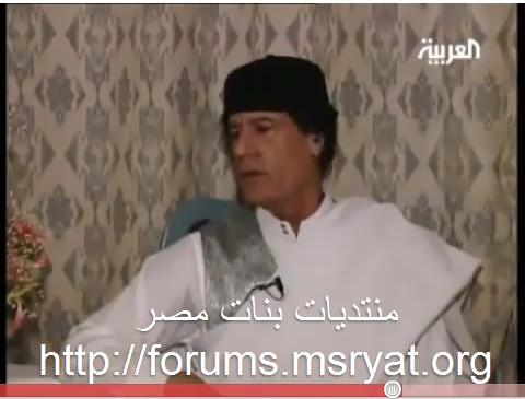 Gadhafi in white