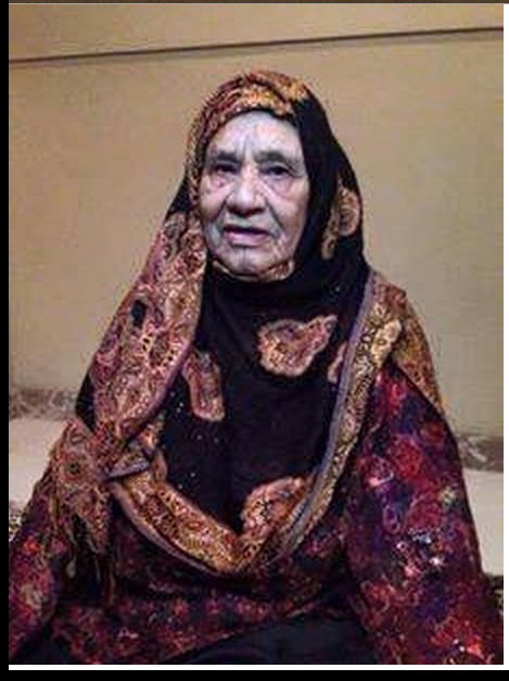 Madame Mohammed Abdul Salam Bou-Mnyar, a greatly older sister to Mu'ammar